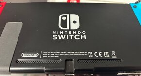 Nintendo switch -tv Dock ,2ks hry - 2