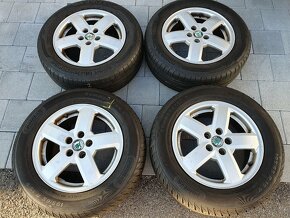 Alu kola skoda 5x100 r15 6j et38 pneu 195/65/15 - 2