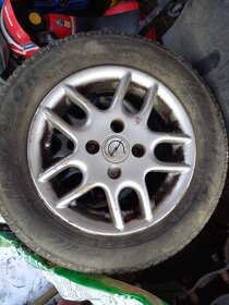 Kola z Opel Corsa 4x100 (165/70 R13) - 2