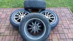 Alu kola Škoda/VW 6.5Jx16 5x112+letni pneu - 3