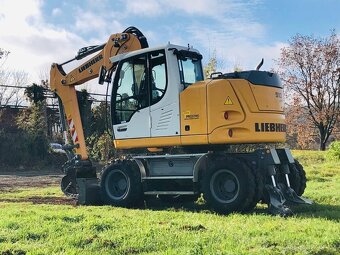 Kolové rypadlo Liebherr A910 - 3