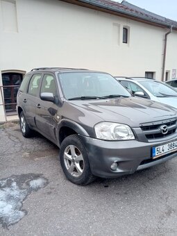 Mazda tribute - 3