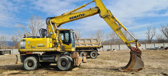 Báger Komatsu PW220 - 3