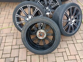 Alu kola 7Jx17 4x100 ET36+ pneu 215/40ZR17 83W - 3