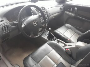 Interiér Mazda 323F BJ - sedadla a tapecí - 3