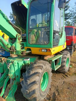 Komatsu PW 95 , otočný kolový bagr - 3