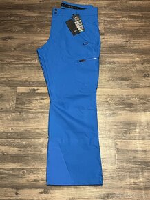 Nové Lyžařské kalhoty Oakley modré, velikost L - 3