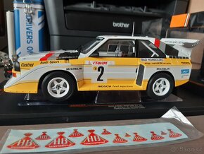 Audi Sport Quattro  a  Mitsubishi Lancer RS Evo V  1:18  IXO - 3