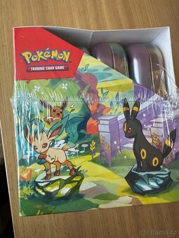 Pokemon prismatic evolutions sealed mini tin display - 3