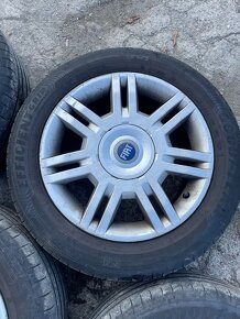 Alu kola i s pneu 205/55 R16, cena 2900,- Kč. - 4