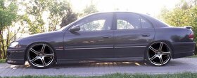 Opel Omega B přední spoiler, kryty prahů STEINMETZ look - 4