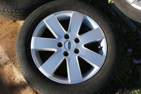 4ks alu kola Ford R16 pekny stav a zimni pneu Kleber 205/55 - 4