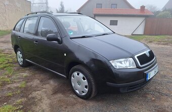 prodám Škodu Fabii kombi 1.2 HTP 47kw ,rok výroby 2004 - 4