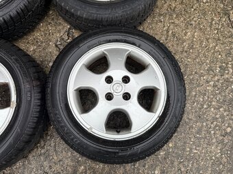 Zimní sada Originál OPEL 4x100 - 185/65/15 Dunlop - vz. 7mm - 4