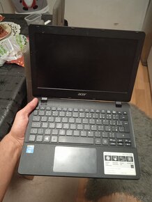 Acer Aspire  model ES1-111M -CO2R - 4