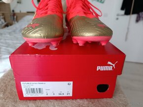 Dětské kopačky PUMA FUTURE Z 3.4 NJr FG/AG Jr + štulpny Nike - 4