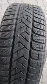 Prodám 2 x zimní pneu Pirelli 215/60/16 - 4