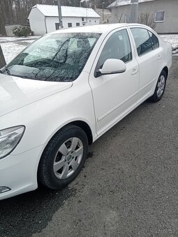 Škoda octavia 2.0tdi-103kw-2011 - 4