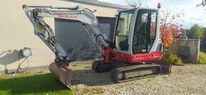 minibagr Takeuchi TB235. - 4