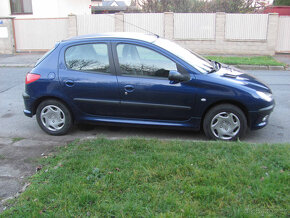 Peugeot 206  1.4i - 4