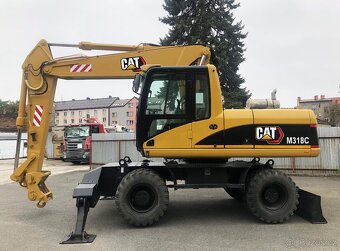 Caterpillar M318C - 4