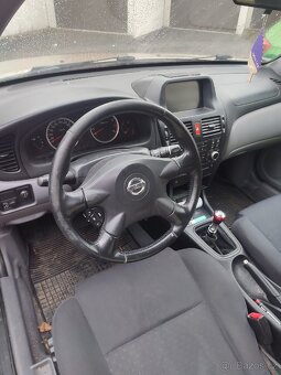 Nissan Almera n16 hatchback 1.8 - 4