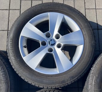 Yeti - 16" Orion + letní 205/55 R16 Bridgestone 90% - 5