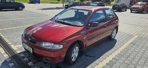 Mazda 323 1,4 3dv.klima,tažné - 5