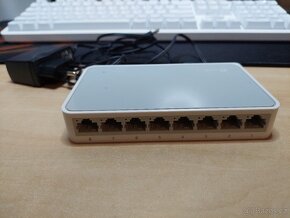 router Netis + switch TP link 8x  10-100Mbps - 5