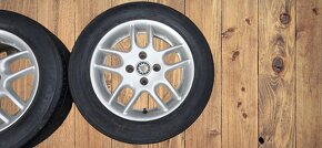 ALU  14" 4x100  ET38 s celoročními pneu 185/60/14 - 5