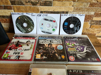 PS3 Super Slim 500GB + 10 her - 5