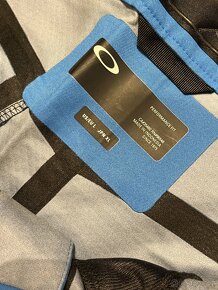 Nové Lyžařské kalhoty Oakley modré, velikost L - 5