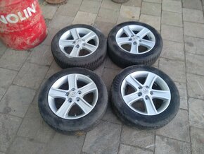 Mazda  16" ALU( po laku) 5x114,3 vč. Zimních pneu  5mm - 5