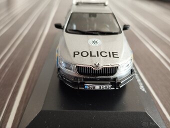 Škoda Octavia combi III policie ochranný rám 1:43 Dea - 6