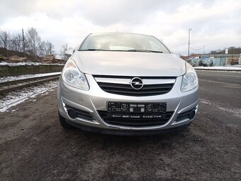 Opel Corsa D 1,4benzin 66kw 2009 dovoz DE - 6