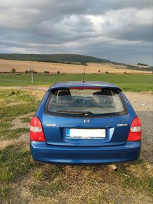 Mazda 323f bj - 6