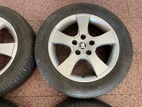 Originalní ALU kola Škoda 5x112 r16 zimní pneu 6mm - 6