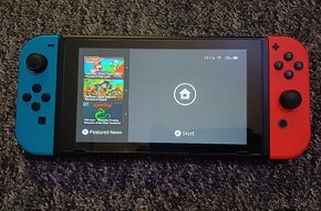 Nintendo switch (perfektní stav) + 6 her + příslušenství - 6