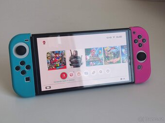 Nintendo Switch OLED + 10 HER - 6