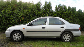 Mazda 323 1.5i 65kw rok 1997 STK 04/2025 původ ČR - 6