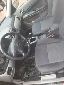 Nissan almera 1.5 - 6