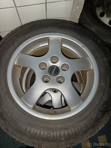 Zimní pneu ALU kola  114,3 - ET 40 - 215/65 R16 - 7