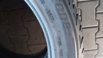 Prodám 2 x letní pneu Bridgestone 215/50/18 - 7