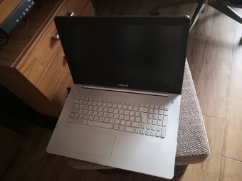 Asus N750J - 7