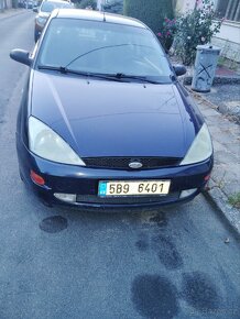 Ford Focus 1,6 - 7