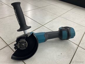 Makita Aku úhlová bruska DGA511RTJ + 2x Aku, nabíječka - 7