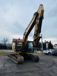 Pásové rypadlo Caterpillar 320W - 8