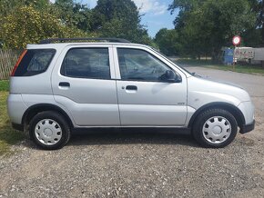 Suzuki Ignis 1.3 GLi  4x4 - 8