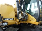 CATERPILLAR M313D - kolové rýpadlo, - 8