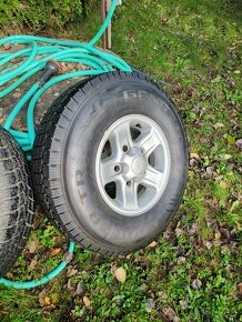 Kola Land Rover Defender 235/85 R16 - 8